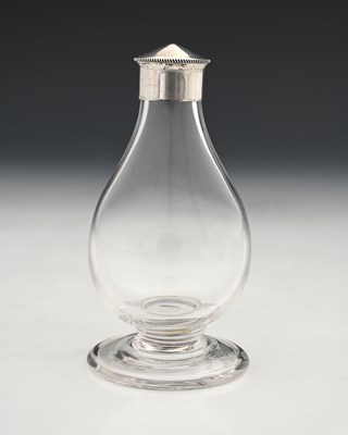 Lot 201 - A Gothic Revival silver-mounted glass bottle,...