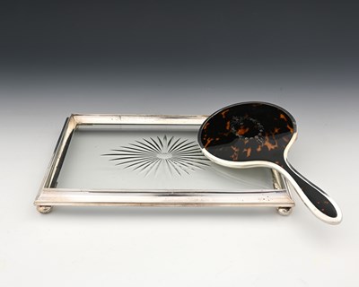 Lot 211 - A George V silver-mounted glass dressing table...