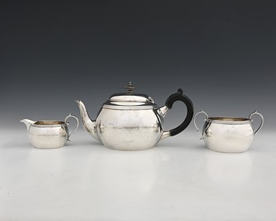 Lot 213 - A George V silver three-piece tea set,...