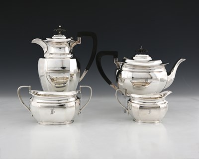 Lot 214 - A George V silver four-piece tea service,...