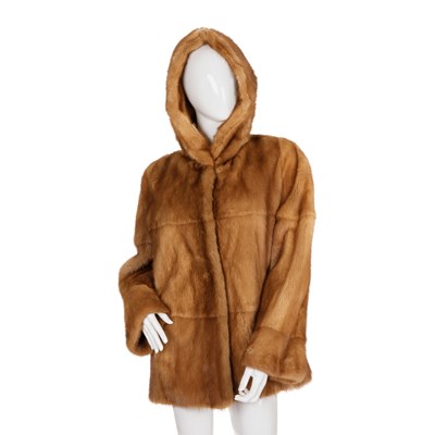 Lot 447 - A gold mink hooded coat