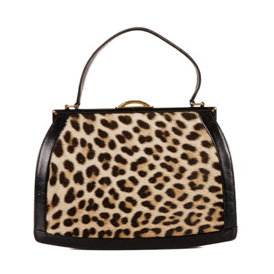 Lot 416 - A vintage 1960s black leather and leopard fur handbag