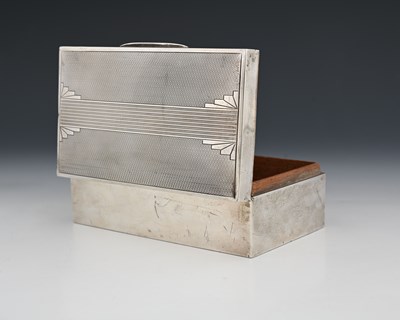 Lot 245 - A George VI silver Art Deco cigarette box, of...