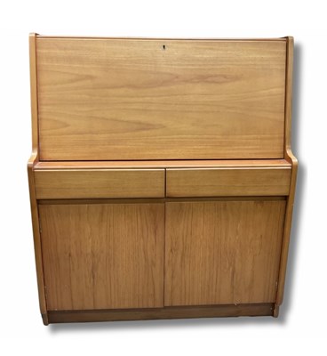 Lot 950 - A mid-century Remploy teak veneer bureau with...