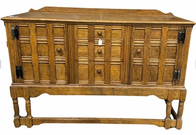 Lot 898 - A 20th century light oak sideboard, featuring...