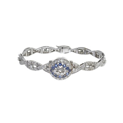 Lot 125 - A mid 20th century platinum diamond and sapphire bracelet