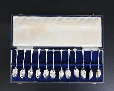 Lot 93 - A cased set of twelve George V silver...