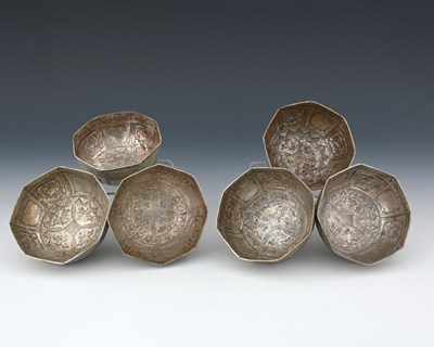 Lot 20 - A set of six silver-coloured metal octagonal...