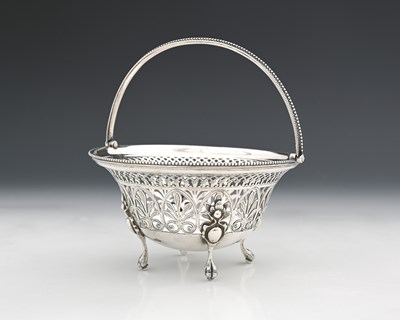 Lot 172 - A Victorian silver swing-handle basket, of...