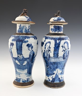 Lot 381 - Two Chinese blue and white altar vases,...