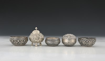 Lot 193 - An Eastern silver-coloured metal pepperette,...