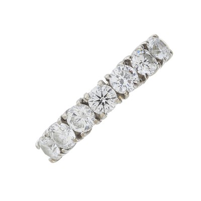 Lot 116 - An 18ct gold diamond half eternity ring