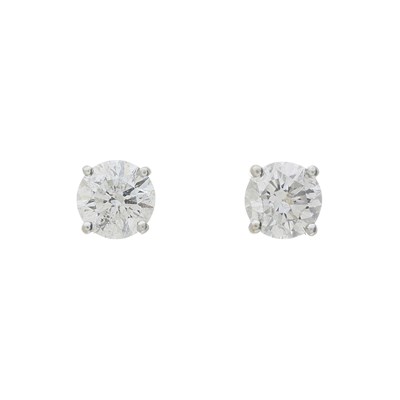 Lot 97 - A pair of 18ct gold diamond single-stone stud earrings