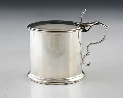 Lot 102 - A George III silver drum form mustard pot, the...