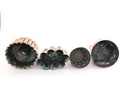 Lot 219 - Four Victorian copper jelly moulds, various...