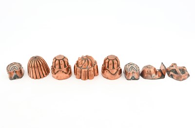 Lot 215 - Eight Victorian miniature copper jelly moulds,...