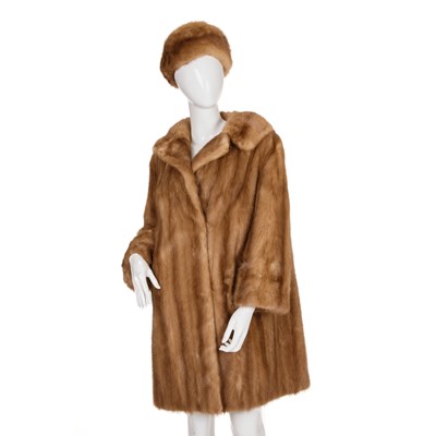 Lot 511 - A pastel mink coat with hat