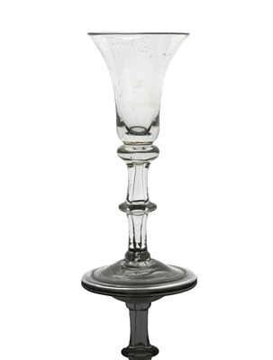 Lot 466 - A George II hollow stem wine glass, circa 1735,...