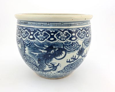 Lot 369 - A Chinese blue and white dragon jardiniere,...