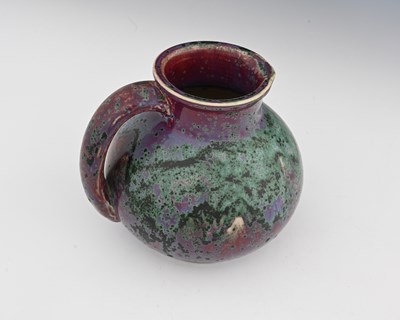 Lot 650 - Ruskin Pottery, a High Fired jug, 1932, ovoid...