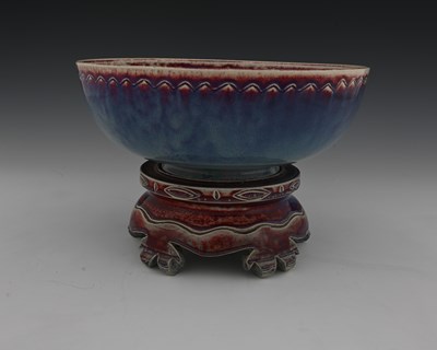 Lot 646 - Ruskin Pottery, a High Fired bowl and a stand,...