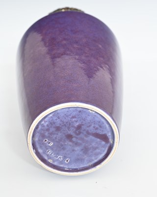 Lot 620 - Ruskin Pottery and A E Jones, a copper mounted...