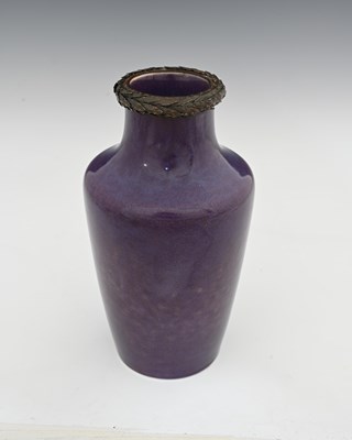 Lot 620 - Ruskin Pottery and A E Jones, a copper mounted...