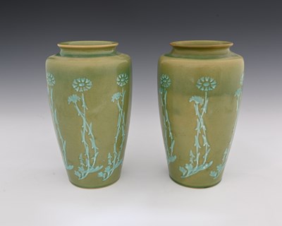 Lot 608 - Ruskin Pottery, a pair of slip stencilled...