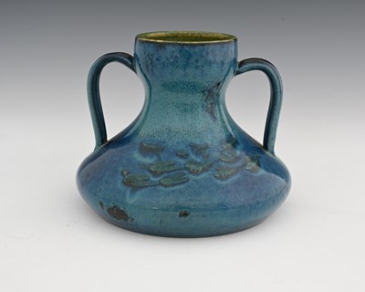 Lot 613 - Ruskin Pottery, a Souffle Glaze twin handled...