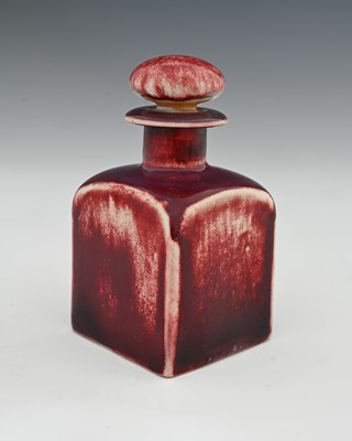 Lot 629 - Ruskin Pottery, a High Fired scent bottle,...