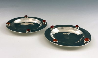 Lot 161 - A pair of Arts and Crafts silver and gem set...