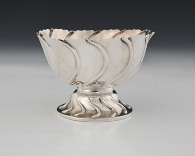 Lot 105 - An Edwardian silver bowl, the exterior with...