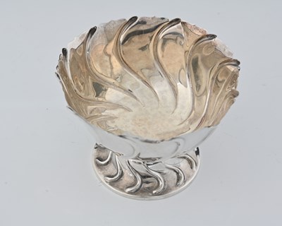 Lot 105 - An Edwardian silver bowl, the exterior with...