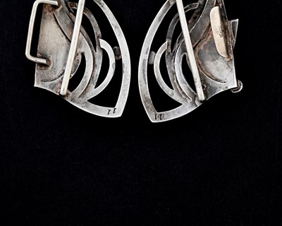 Lot 141 - A Secessionist silver and gem set buckle,...