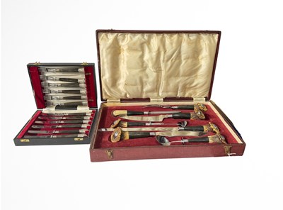 Lot 321 - A cased Cutlass carving set, with antler-type...