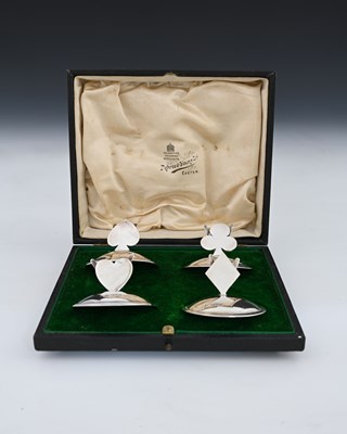 Lot 286 - A cased set of four silver novelty Whist card...