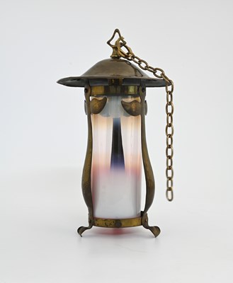 Lot 198 - An Arts and Crafts copper and glass pendant...