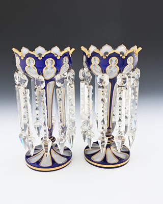 Lot 488 - A pair of Bohemian triple cased glass lustre...