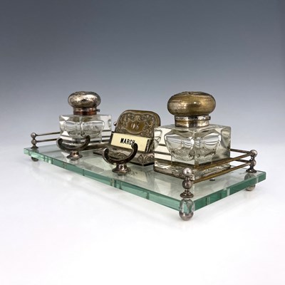 Lot 715 - An Art Nouveau silver plated and glass desk...