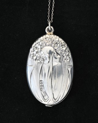 Lot 34 - An Art Nouveau silver locket pendant, import...