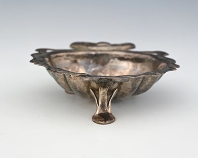 Lot 147 - An Arts and Crafts silver shell form bowl,...