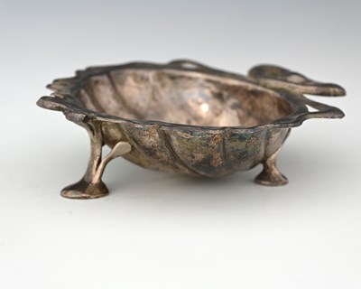 Lot 147 - An Arts and Crafts silver shell form bowl,...