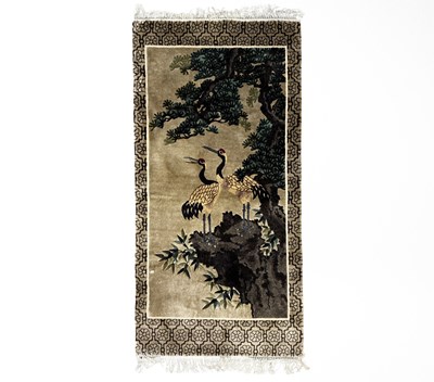 Lot 576 - A contemporary silk Chinese rug featuring...