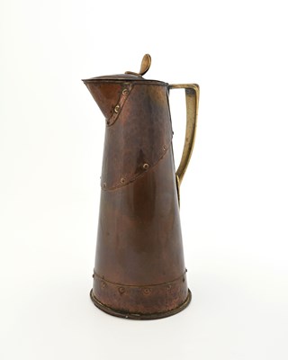 Lot 171 - An Arts and Crafts copper and brass jug,...