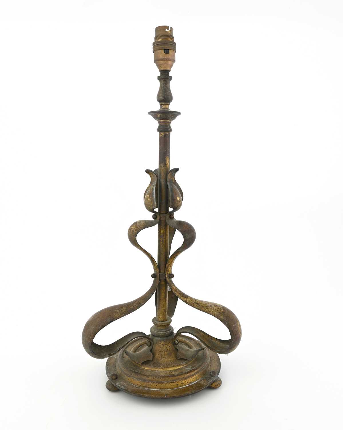 Lot 197 - An Arts and Crafts gilt brass table lamp, in...