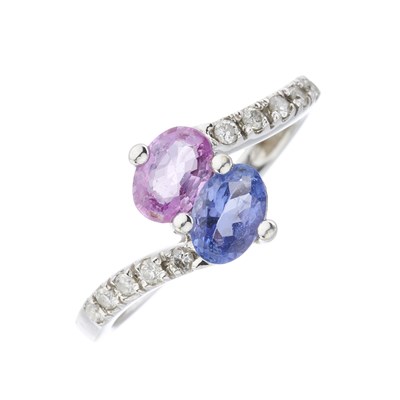 Lot 32 - A 14ct gold vari-hue sapphire and diamond crossover ring