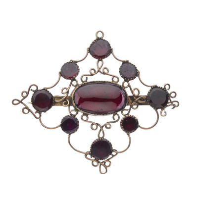 Lot 129 - A 19th century gold garnet openwork brooch