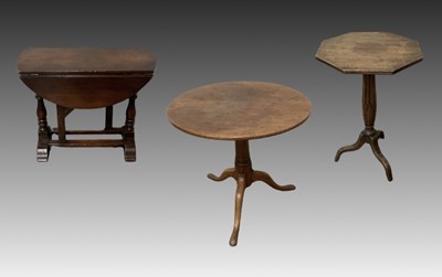 Lot 900 - Three side tables: One round mahogany side...