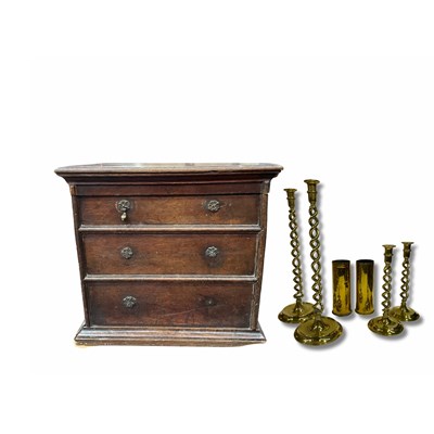 Lot 894 - An oak storage chest with a false drawer cover...