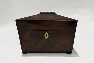 Lot 806 - A lockable mahogany sarcophagus tea caddy on...